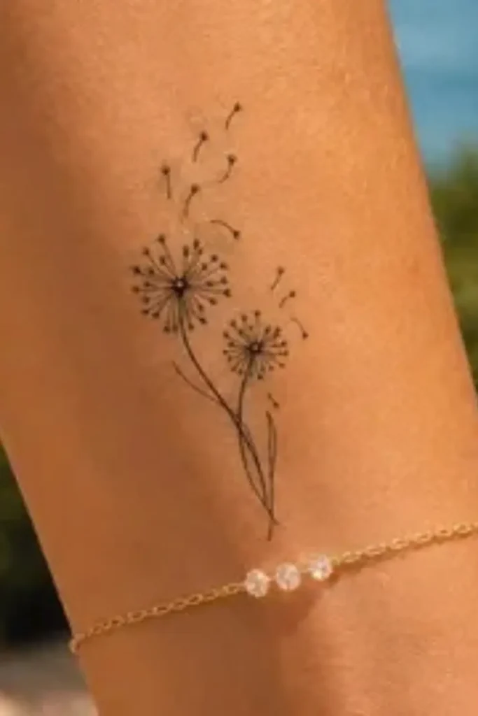 small tattoo ideas, dandelion tattoo with floating seeds on the ankle